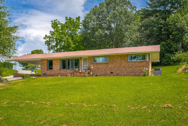 4701 Maywood Ln, Chattanooga, TN 37416 - single story home featuring crawl space, an attached carport, a front lawn, and brick siding