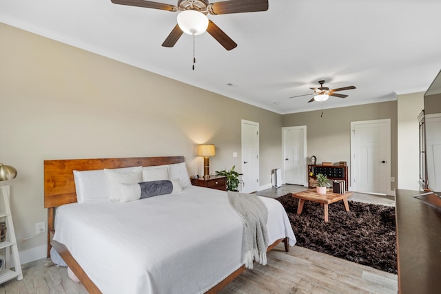 155 Surrey Ln NE, Cleveland, TN 37312 - bedroom featuring light wood finished floors, crown molding, and ceiling fan