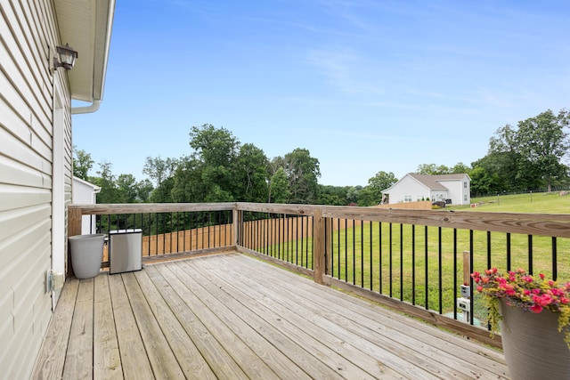 155 Surrey Ln NE, Cleveland, TN 37312 - wooden terrace featuring a lawn and view of wooded area