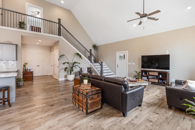 155 Surrey Ln NE, Cleveland, TN 37312 - living area featuring a ceiling fan, high vaulted ceiling, light wood-style flooring, stairway, and recessed lighting