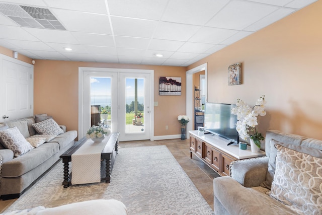 103 Windcrest Pl NW, Cleveland, TN 37312 - living room featuring a paneled ceiling, baseboards, and recessed lighting