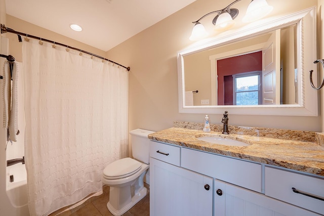 full bathroom featuring tile patterned flooring, vanity, and toilet