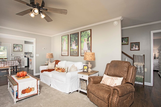 living room featuring crown molding, dark hardwood / wood-style flooring, and ceiling fan