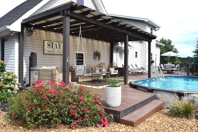 wooden deck featuring a pergola