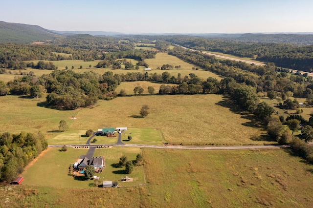 birds eye view of property featuring a rural view