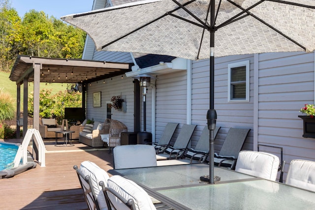 wooden deck with outdoor lounge area