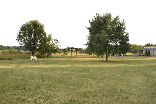 view of yard featuring a trampoline