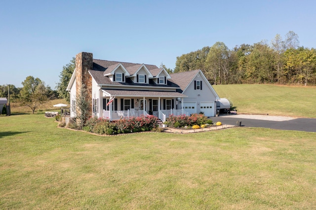 cape cod-style house featuring a porch, a garage, and a front lawn