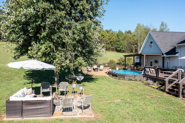 view of yard featuring an outdoor living space and a deck