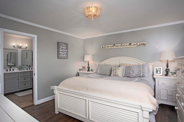 bedroom featuring ensuite bathroom, sink, dark wood-type flooring, and ornamental molding