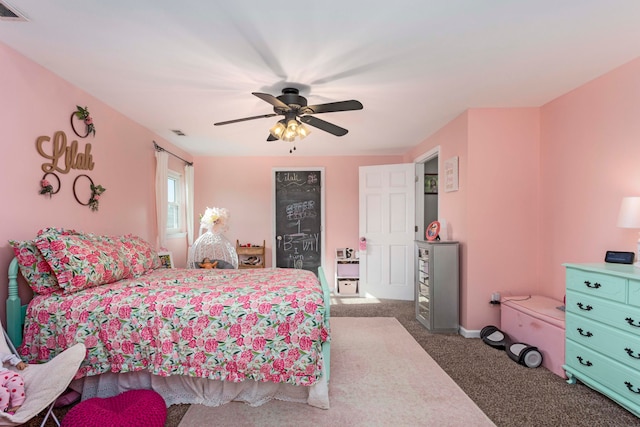 carpeted bedroom featuring ceiling fan