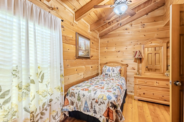 bedroom featuring wood walls, wooden ceiling, lofted ceiling with beams, ceiling fan, and wood-type flooring