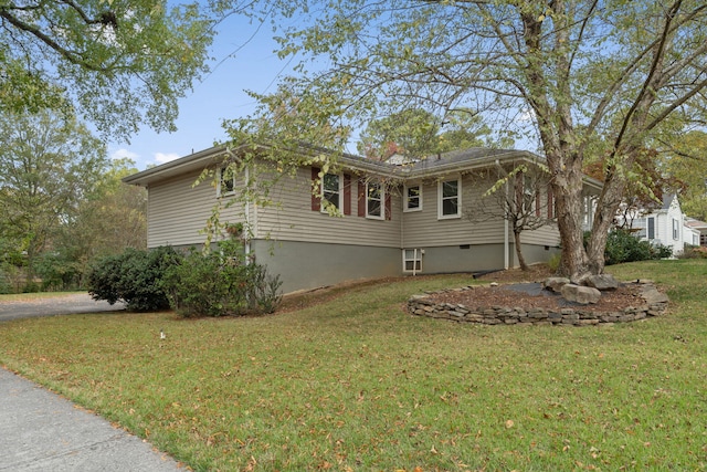 view of home's exterior featuring a yard