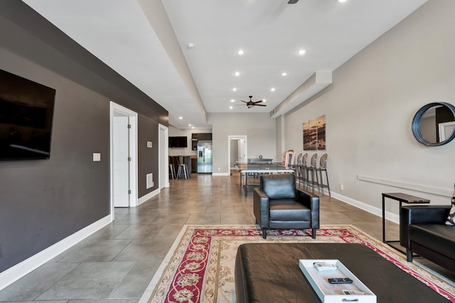 living room featuring ceiling fan