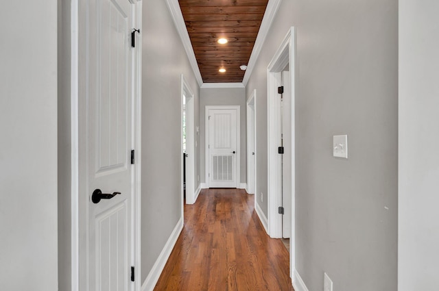 hallway with hardwood / wood-style floors and wooden ceiling