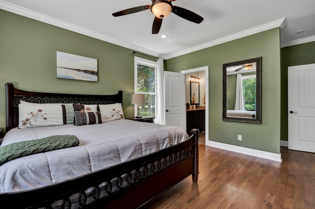 bedroom featuring multiple windows, dark hardwood / wood-style flooring, ensuite bathroom, and ceiling fan