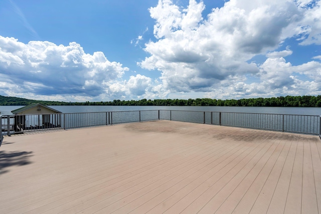 wooden terrace with a water view