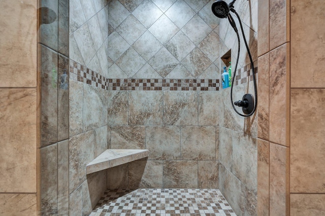 details with a tile shower