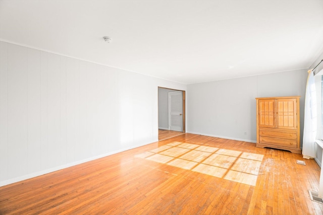 empty room featuring light hardwood / wood-style flooring