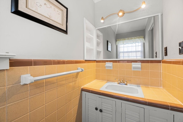 bathroom featuring tile walls and vanity