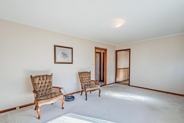 unfurnished room with baseboards, carpet flooring, and ornamental molding