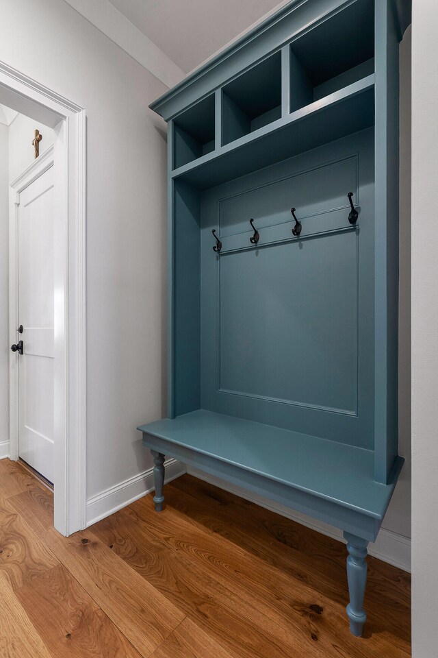 mudroom with hardwood / wood-style flooring