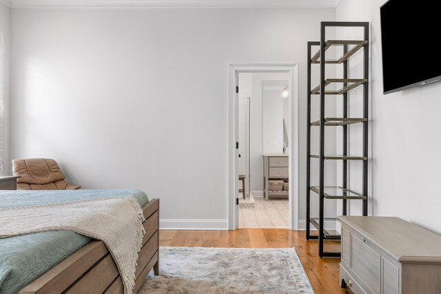 bedroom with light wood-type flooring