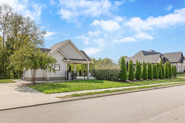 exterior space with a front yard