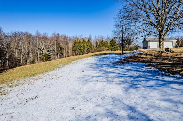 view of yard featuring a garage