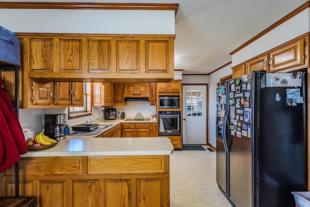 kitchen featuring kitchen peninsula, a textured ceiling, black appliances, crown molding, and sink