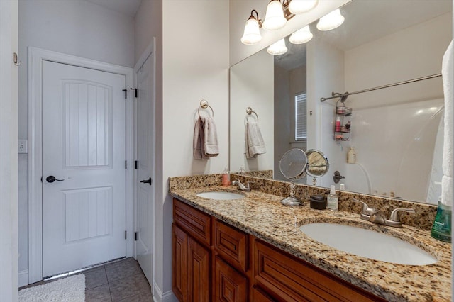 2074 Volunteer Dr SW, Cleveland, TN 37311 - full bathroom featuring double vanity, a sink, and tile patterned flooring