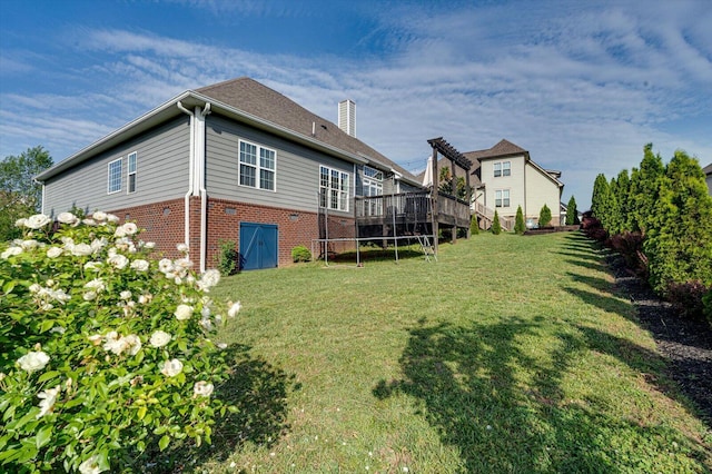 2074 Volunteer Dr SW, Cleveland, TN 37311 - exterior space with a yard, brick siding, a wooden deck, and a chimney