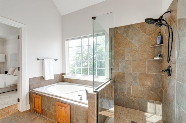 2074 Volunteer Dr SW, Cleveland, TN 37311 - full bath with vaulted ceiling, ensuite bathroom, a garden tub, and tiled shower