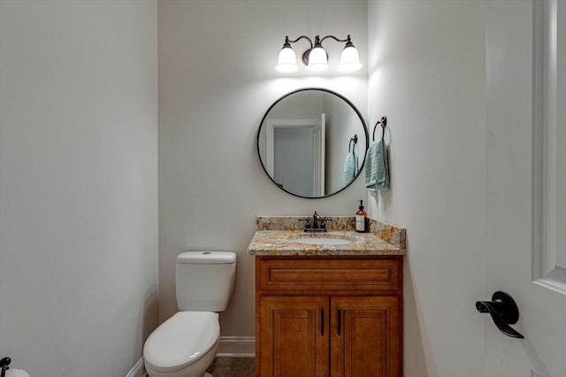 2074 Volunteer Dr SW, Cleveland, TN 37311 - half bathroom with vanity, baseboards, and toilet