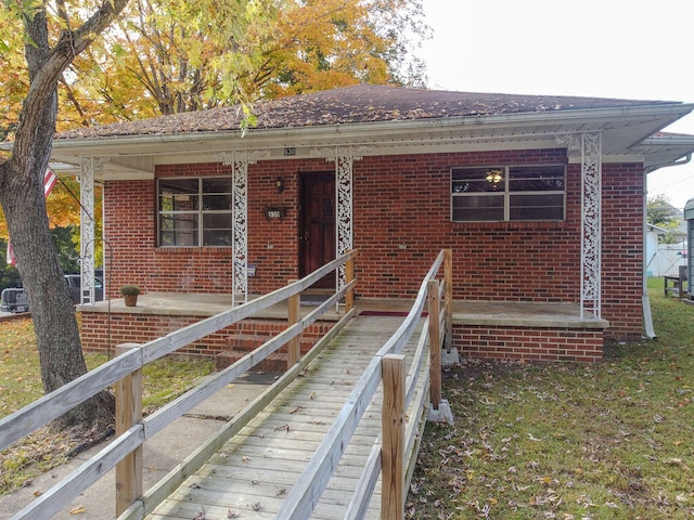 view of front of property featuring covered porch