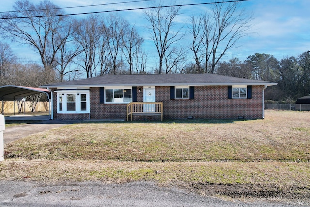 single story home with a carport and a front yard