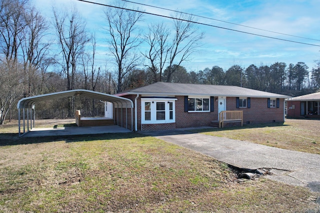 single story home featuring a carport and a front lawn