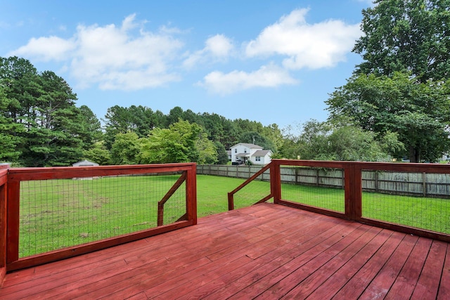 deck featuring a lawn