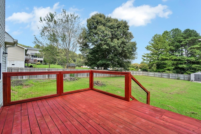 wooden deck with a yard