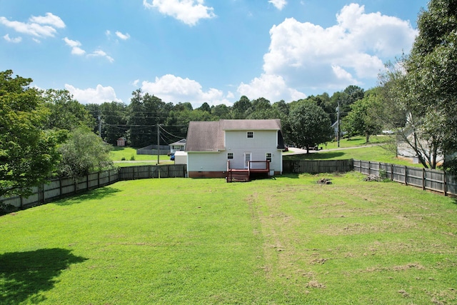 view of yard with a deck