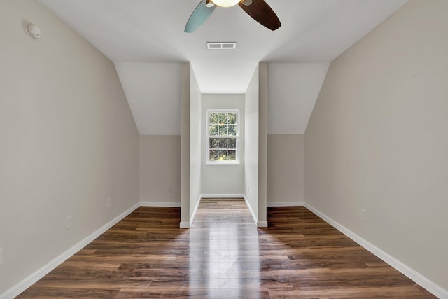 bonus room with lofted ceiling, ceiling fan, and dark hardwood / wood-style floors