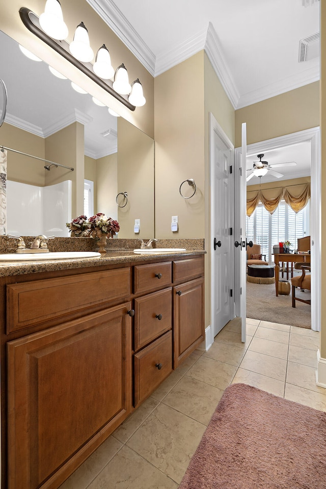 bathroom featuring tile patterned floors, ceiling fan, and ornamental molding