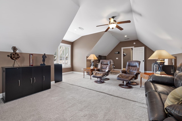 living room featuring light carpet, ceiling fan, and lofted ceiling