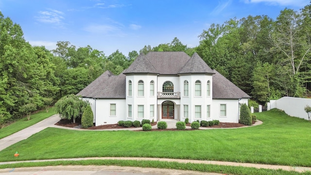 715 Pembridge Cir NW, Cleveland, TN 37312 - french country home featuring stucco siding, a front yard, and roof with shingles