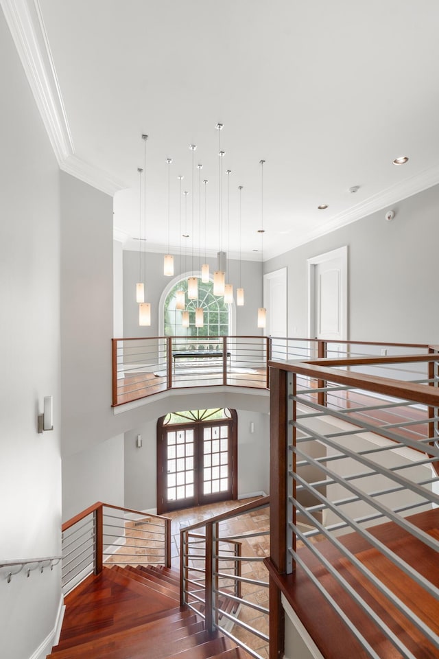 715 Pembridge Cir NW, Cleveland, TN 37312 - staircase featuring ornamental molding, wood finished floors, recessed lighting, and a chandelier