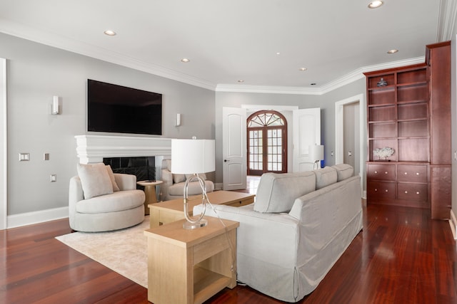 715 Pembridge Cir NW, Cleveland, TN 37312 - living room featuring dark wood finished floors, recessed lighting, crown molding, and a high end fireplace