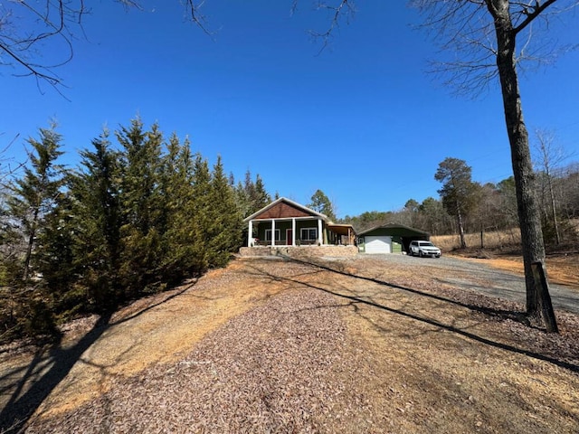 single story home featuring covered porch