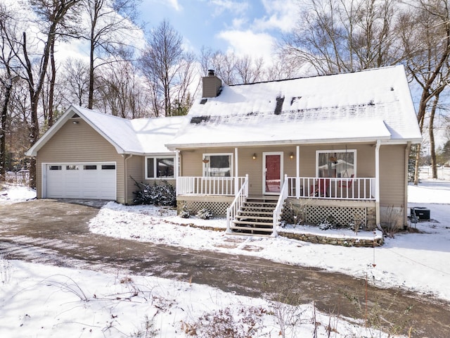 view of front of house with a garage, stairway, covered porch, and a chimney