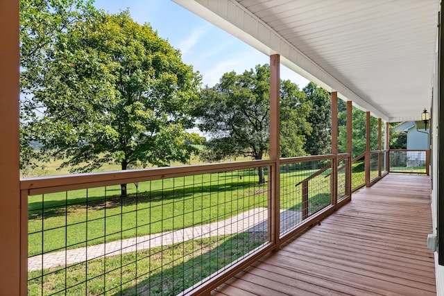 wooden terrace featuring a porch