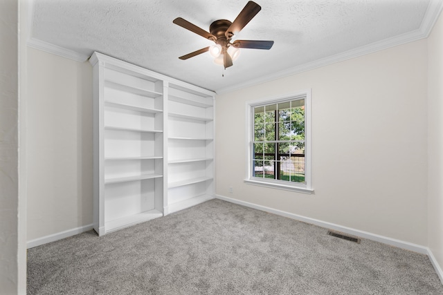 7000 Davis Ferry Rd, Loudon, TN 37774 - spare room featuring a ceiling fan, carpet flooring, a textured ceiling, ornamental molding, and baseboards